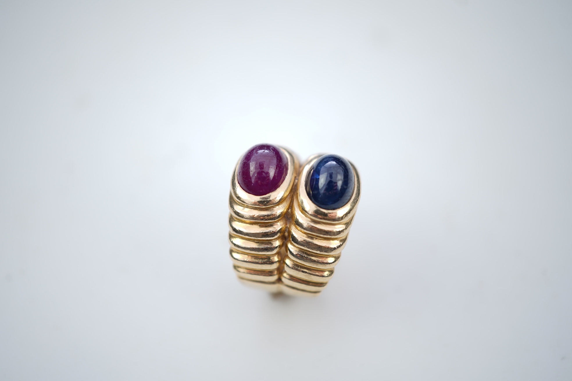A sapphire and ruby ring